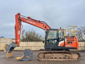 Image of a used Hitachi ZX130LCN-7 with New & Unused set of buckets